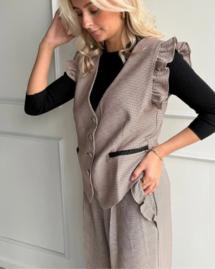 Stories from the Atelier vest as magic sand check