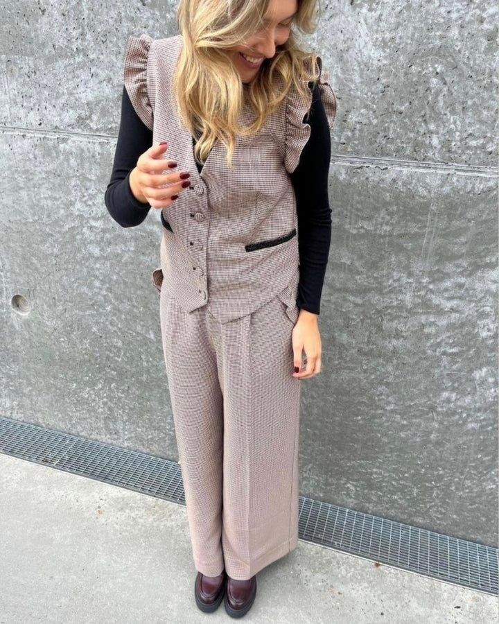 Stories from the Atelier vest as magic sand check