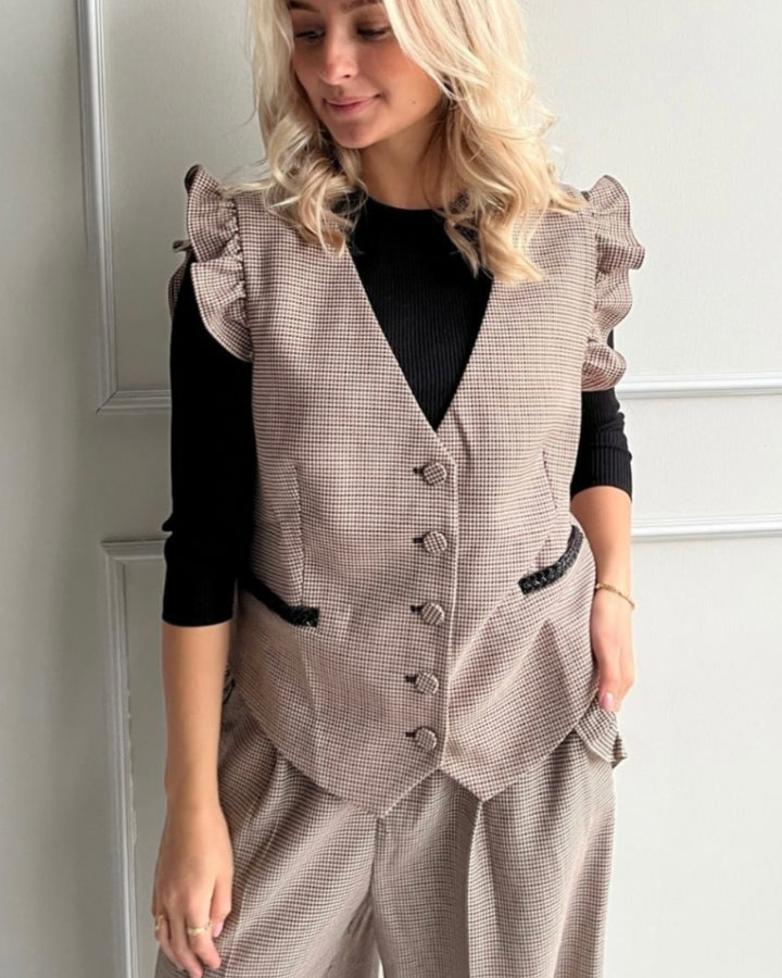Stories from the Atelier vest as magic sand check