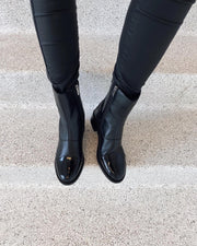 She patent boots black